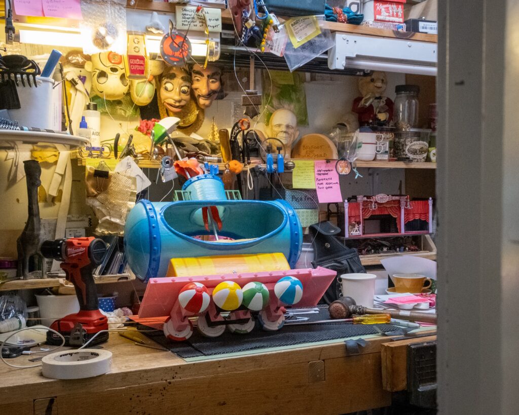 A photo of a puppet workshop. 